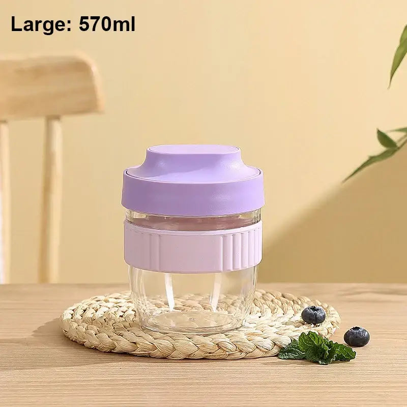 Clear glass reusable drink bottle with lavender silicone lid and grip band 570ml for decorbites breakfast cup use