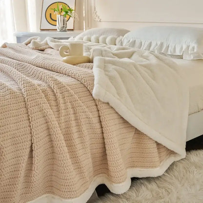 Cream-colored mint and white cozy faux rabbit fur blanket with ribbed texture and soft fleece lining for bedroom decorbites cozy faux