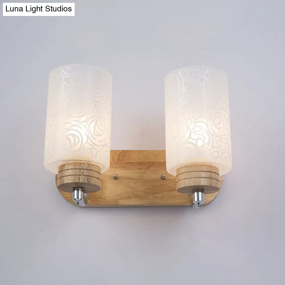 DecorBites™ DecorBites™ Modern 2-headed White Glass Cylinder Wall Sconce with Wood Wall Mount and Rose Pattern