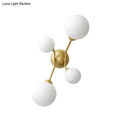 DecorBites™ DecorBites™ Modern 4-Light Sconce with Cream Glass Shade and Black/Gold Finish