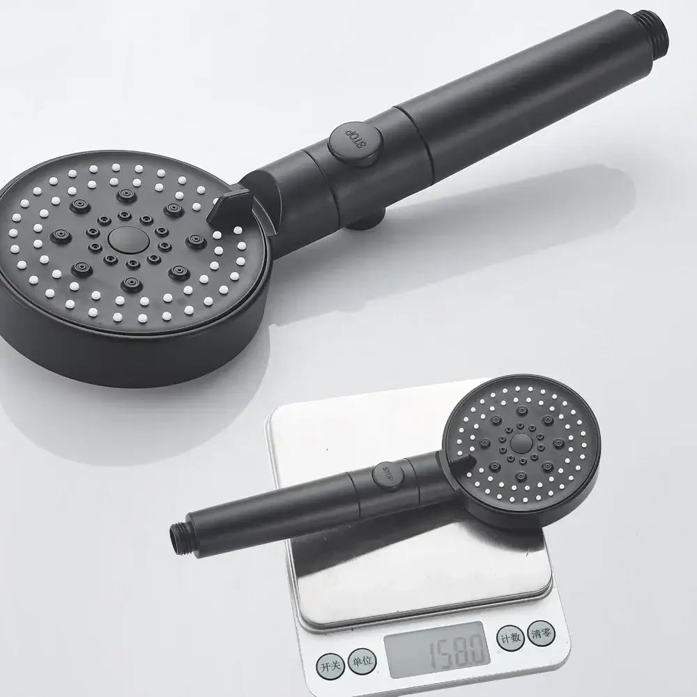 Modern black matte-finish 5-function shower head with multiple spray nozzles and textured grip handle for bathrooms
