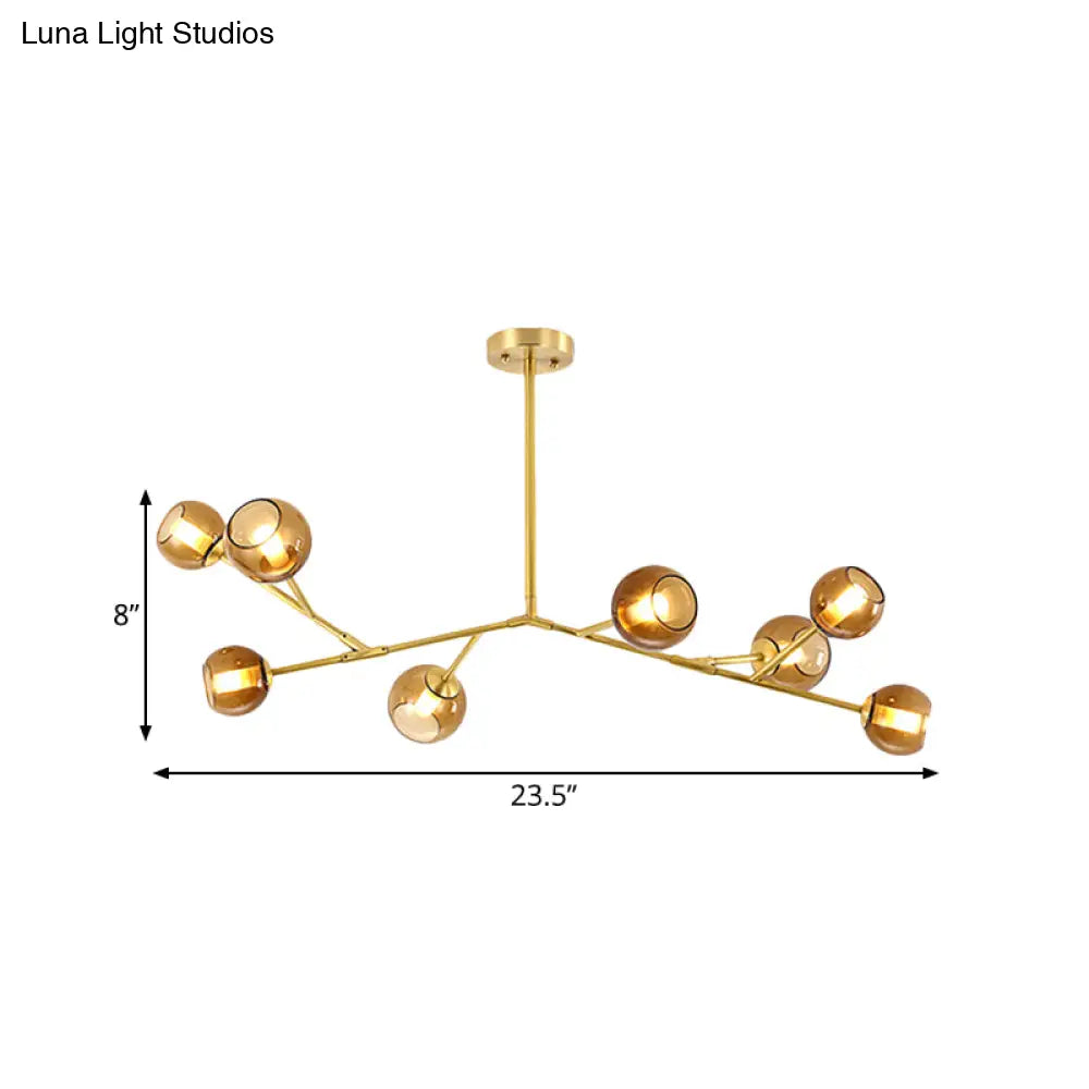 Lámpara de techo tipo araña moderna de latón con 8 bombillas y pantallas de cristal ámbar