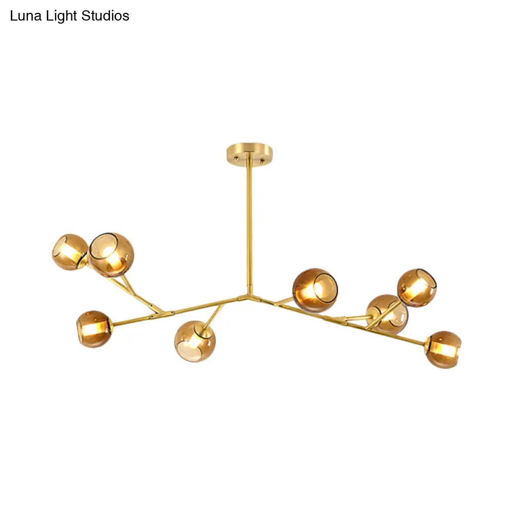 Lámpara de techo tipo araña moderna de latón con 8 bombillas y pantallas de cristal ámbar