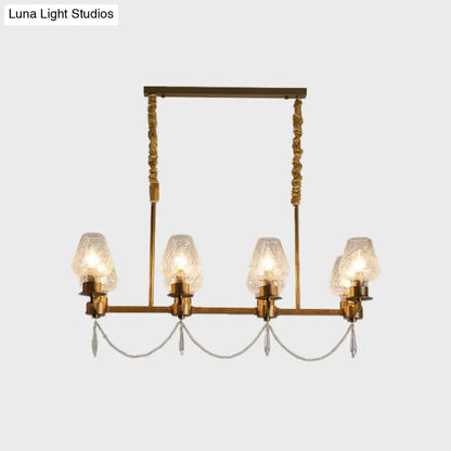 Lámpara colgante moderna de 8 luces DecorBites™ con acabado de latón para isla de cocina.