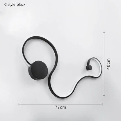 Modern abstract black iron body led wall lamp with sleek curved metallic frame for bedroom decorbites iron body sconce