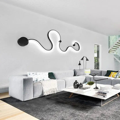 Modern abstract black iron body led wall lamp with glowing illumination for stylish bedroom decorbites iron body design