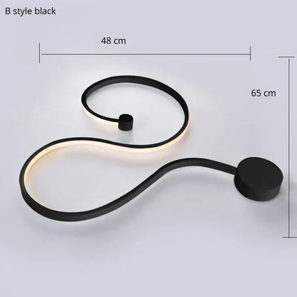 Modern abstract black iron body led wall lamp with sleek s-shaped design and illuminated edges for bedroom decorbites iron body