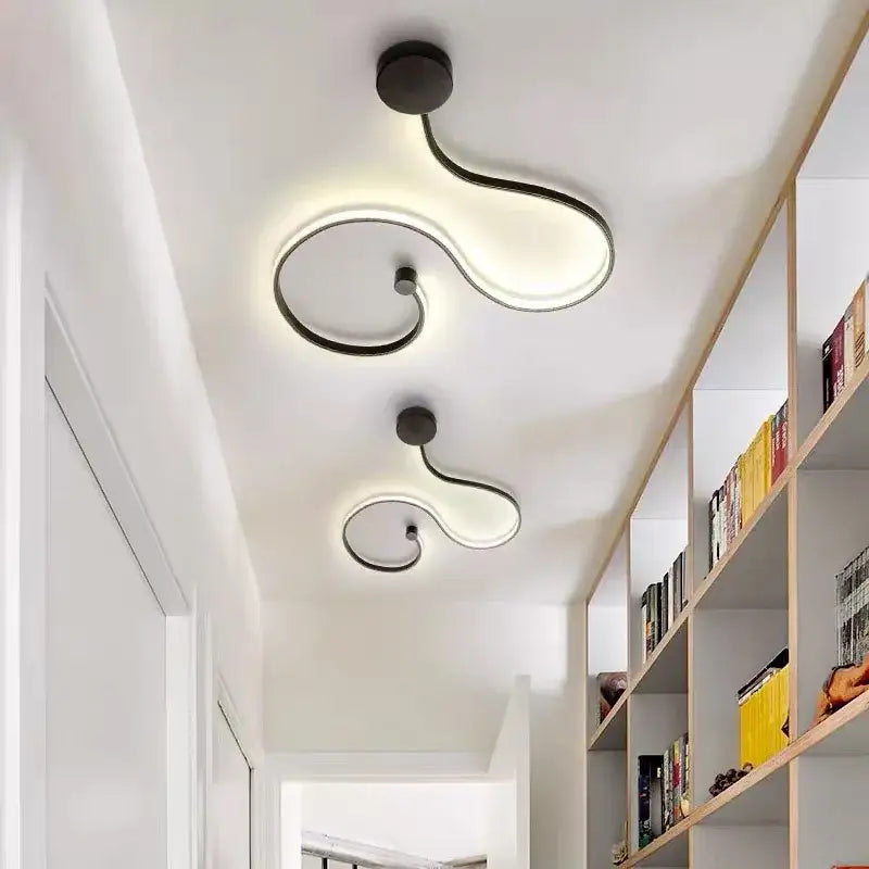 Modern abstract black iron body wall lamp with sleek curved led ceiling light fixtures for bedroom living room decorbites iron body