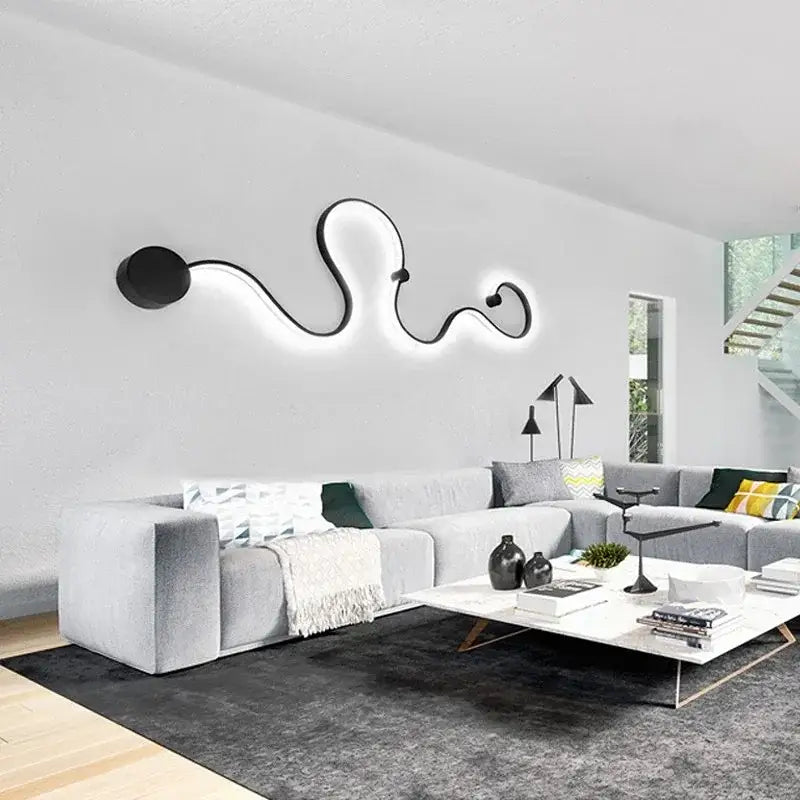 Modern abstract black iron body wall lamp with glowing led illumination for bedroom and living room decorbites iron body