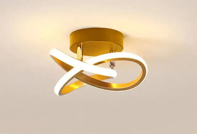 Modern infinity-loop led ceiling light with sleek gold and white design for kitchens decorbites led ceiling light