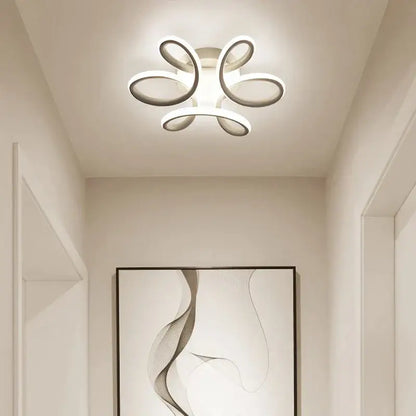 Modern abstract black and white decorbites led ceiling light with sleek curved acrylic rings for kitchens ceiling light