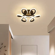 Modern abstract black and white decorbites led ceiling light with sleek intertwined rings for kitchen decor