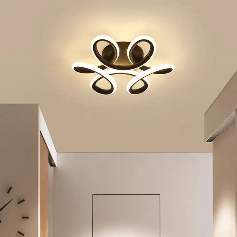 Modern abstract black and white decorbites led ceiling light with sleek intertwined rings for kitchen decor