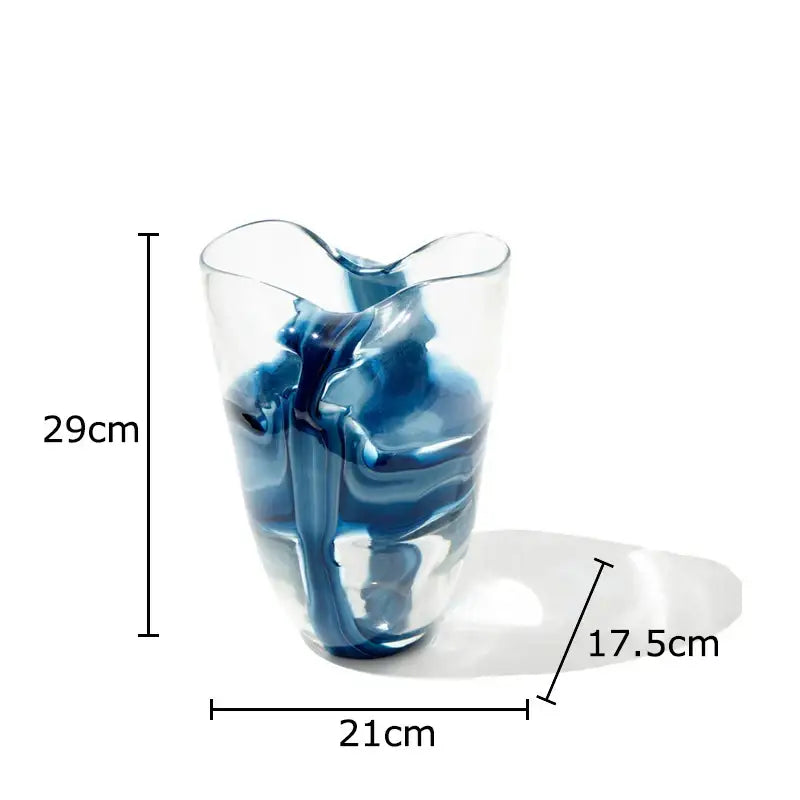 A modern abstract blue striped glass vase with flowing swirls and wavy rim for decorbites living room decor