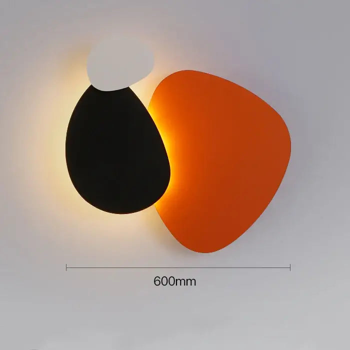 Modern abstract geometric art wall lamp with black teardrop and orange triangular shade for bedroom and living room