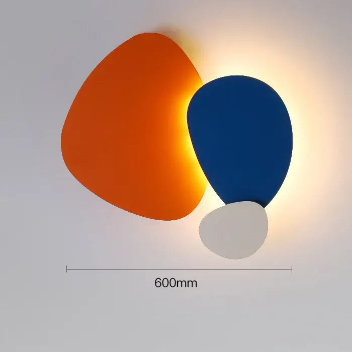 Modern abstract geometric art wall lamp with three overlapping shapes in orange blue and white for bedroom and living room