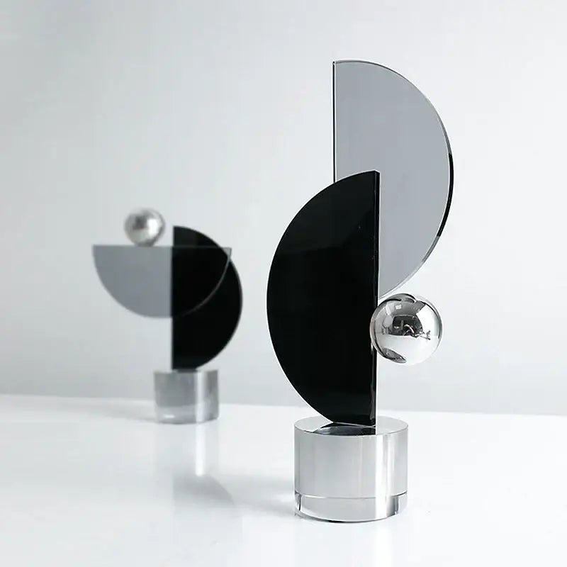 Modern abstract geometric crystal ornaments ring sculpture with sleek black and mirrored silver panels and chrome spheres