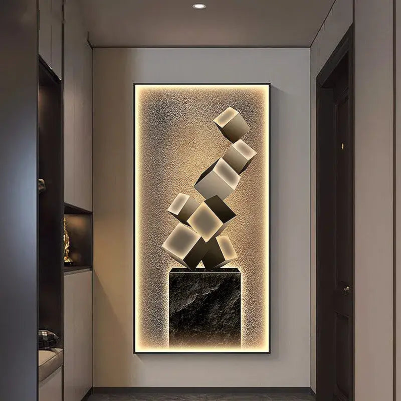 Modern abstract metallic led wall lamp with interlocking black and white cubes on dark marble base for living room decor