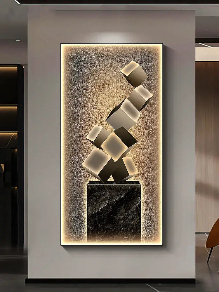 Modern abstract metallic led wall lamp with interlocking black and white cubes on dark marble base for modern decor