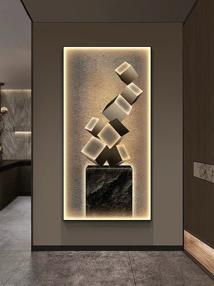 Modern abstract metallic led wall lamp with interlocking black and white cubes on dark marble base for modern decor