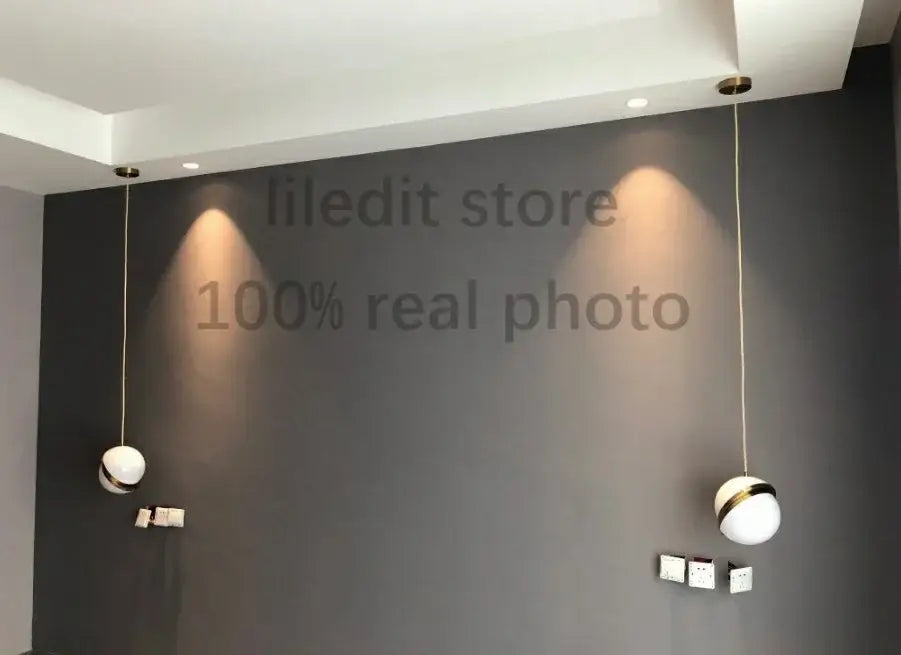Modern acrylic ball pendant lamp in dark gray for living room lighting featuring a stylish pendant light design