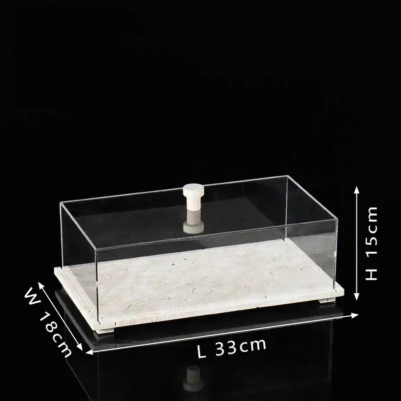 Modern acrylic display case with clear rectangular acrylic display and white travertine base for dining room use