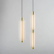 Modern acrylic minimalist pendant lights with frosted glass cylinders and brass accents for bedroom decorbites acrylic minimalist pendant