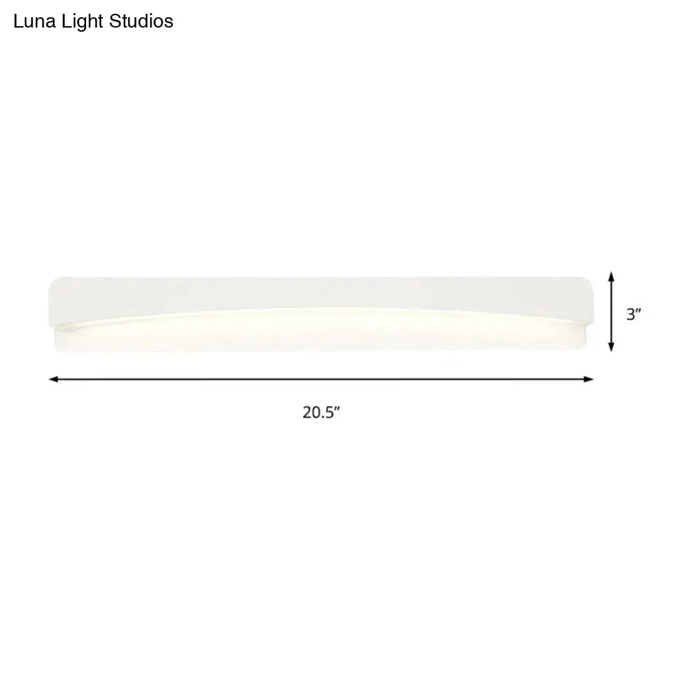 A sleek modern white acrylic rectangular vanity light fixture with soft diffused lighting for bathroom use
