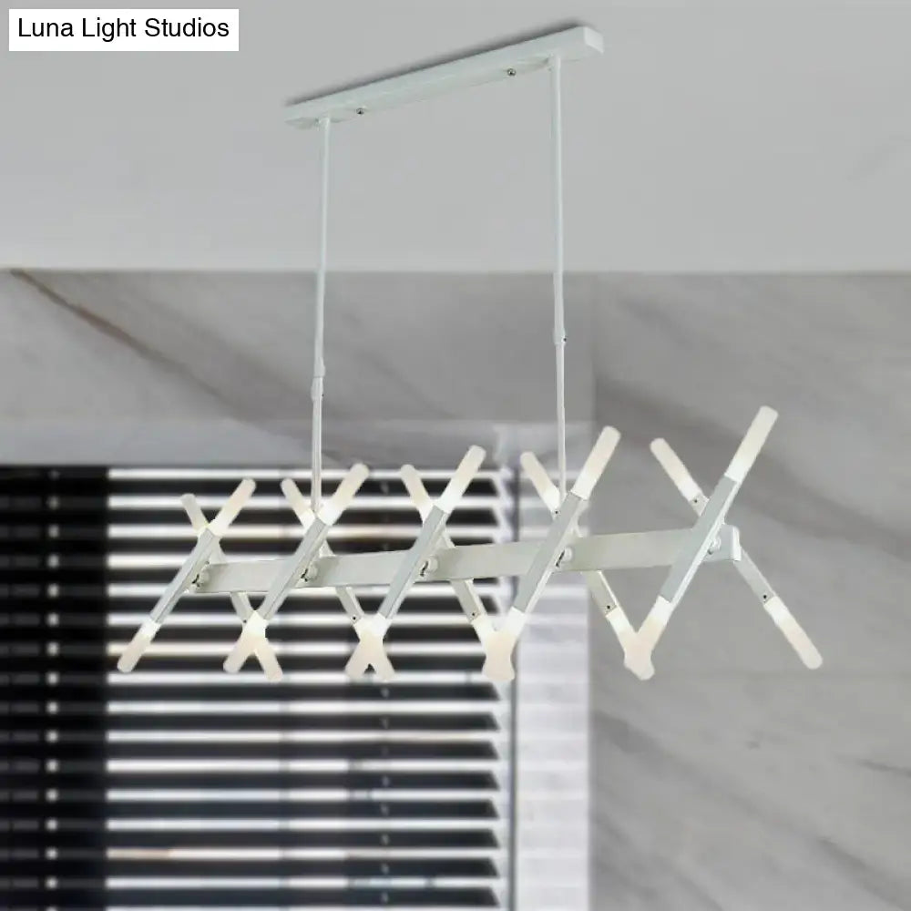 Modern white acrylic tube island pendant light with geometric cross design and sleek metallic finish for dining room lighting