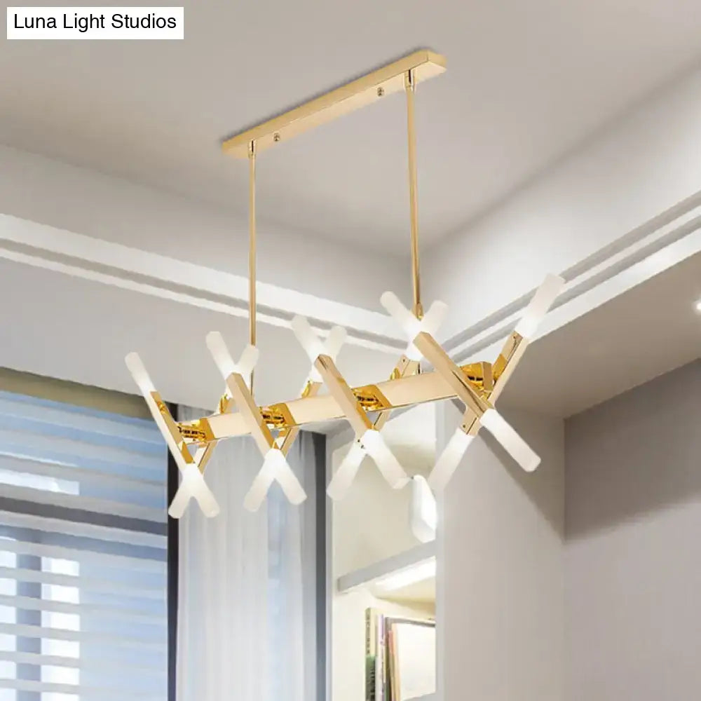 Modern gold-toned acrylic tube island pendant light with intersecting arms and frosted glass shades for dining room lighting