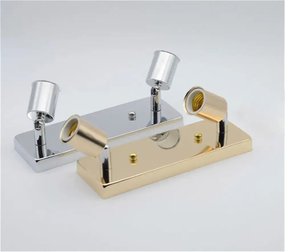 Two sleek modern wall-mounted adjustable ceramic ceiling lights with black chrome and gold finish for bedroom decorbites