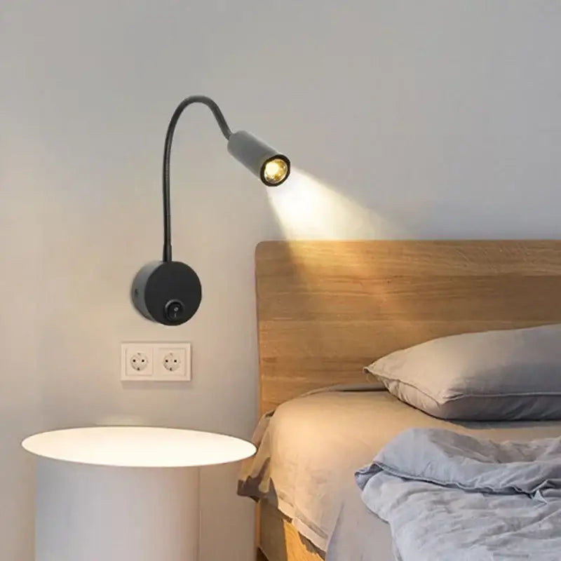Black gooseneck wall sconces with adjustable head emitting warm light for decorbites led bedside wall use