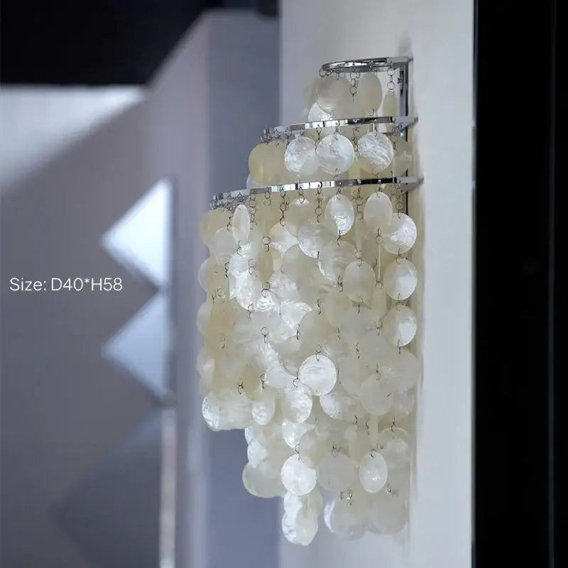 Modern aeolian bells shell chandelier featuring tiered translucent iridescent mother-of-pearl shells for elegant decorbites aeolian bells lighting