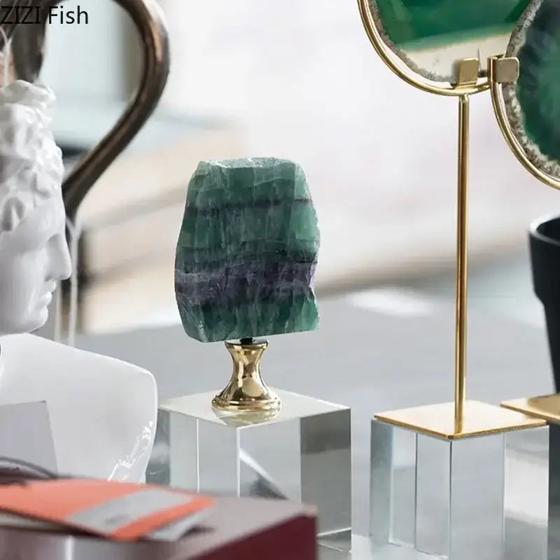 Polished green and purple agate fluorite geode on a gold-toned decorbites crystal base for modern living room decor