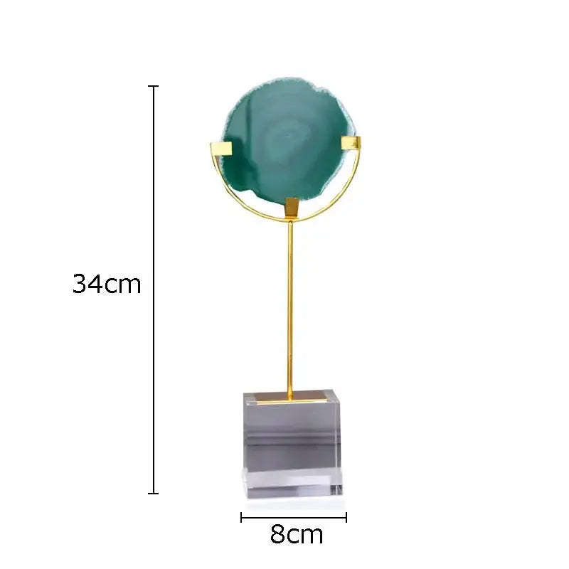 A modern agate fluorite crystal base ornament with teal slice and gold rings on clear acrylic for living room decorbites decor