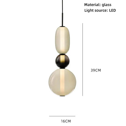 Modern amber and cream colorful glass ball pendant lights feature a sleek stacked design for dining room use