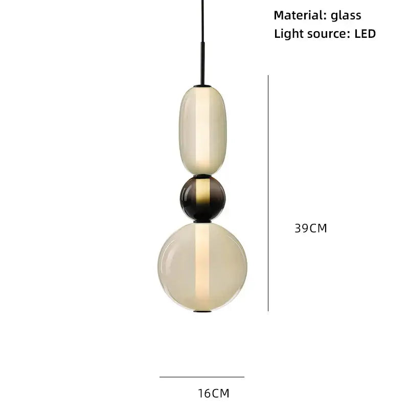 Modern amber and cream colorful glass ball pendant lights feature a sleek stacked design for dining room use