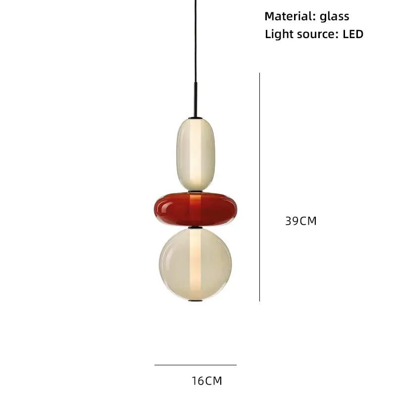 Modern pendant lights with colorful glass ball shades in cream and amber glass illuminated by led for dining room
