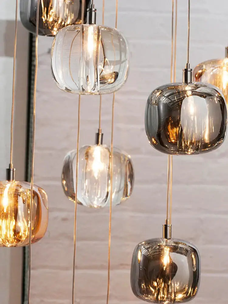 Modern amber and gold crystal led ceiling chandelier with glass pendant lights in clear and frosted metallic decorbites crystal led