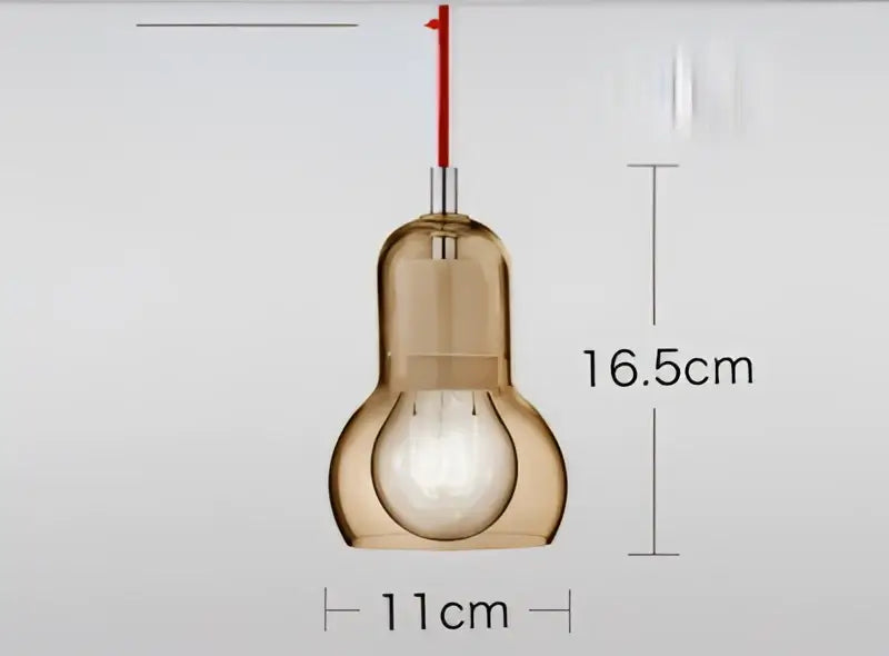 A sleek amber-tinted glass pendant light with red cord suspension for modern dining room glass pendant lights