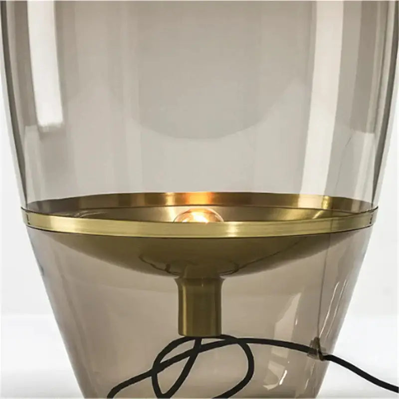 Modern amber balloons led glass table lamp with translucent smoked glass shade and polished brass accents for home office