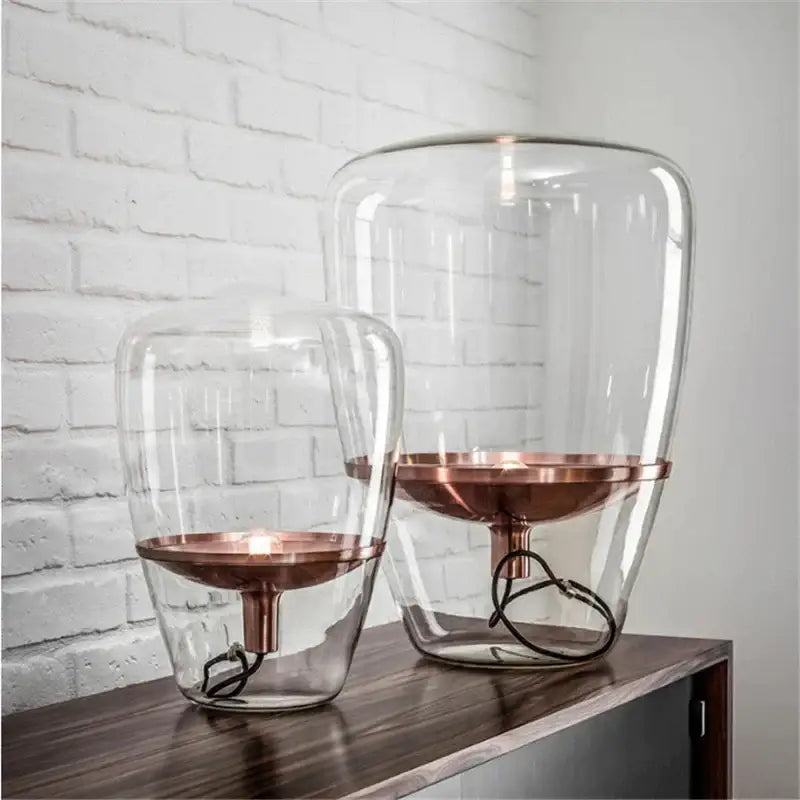 Modern amber balloons led glass table lamp with clear glass and copper base featuring visible internal wiring