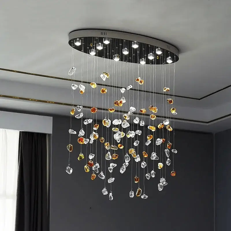 Modern amber and clear crystal dining chandelier with sleek black base and dangling glass beads for decorbites crystal dining