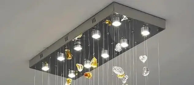 Rectangular modern gold-toned decorbites crystal dining chandelier with amber and clear crystals for living room light