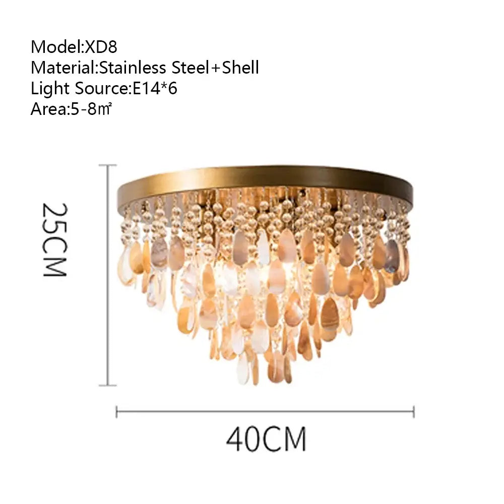 Gold-toned decorbites crystal led ceiling light with circular stainless steel frame and teardrop-shaped shell pendants