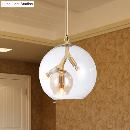 Lámpara de araña moderna de cristal ámbar/transparente para comedor con tres luces.