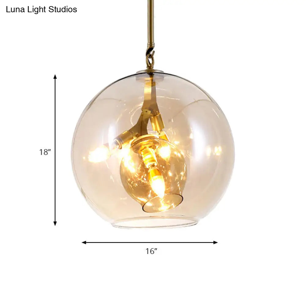 Lámpara de araña moderna de cristal ámbar/transparente para comedor con tres luces.