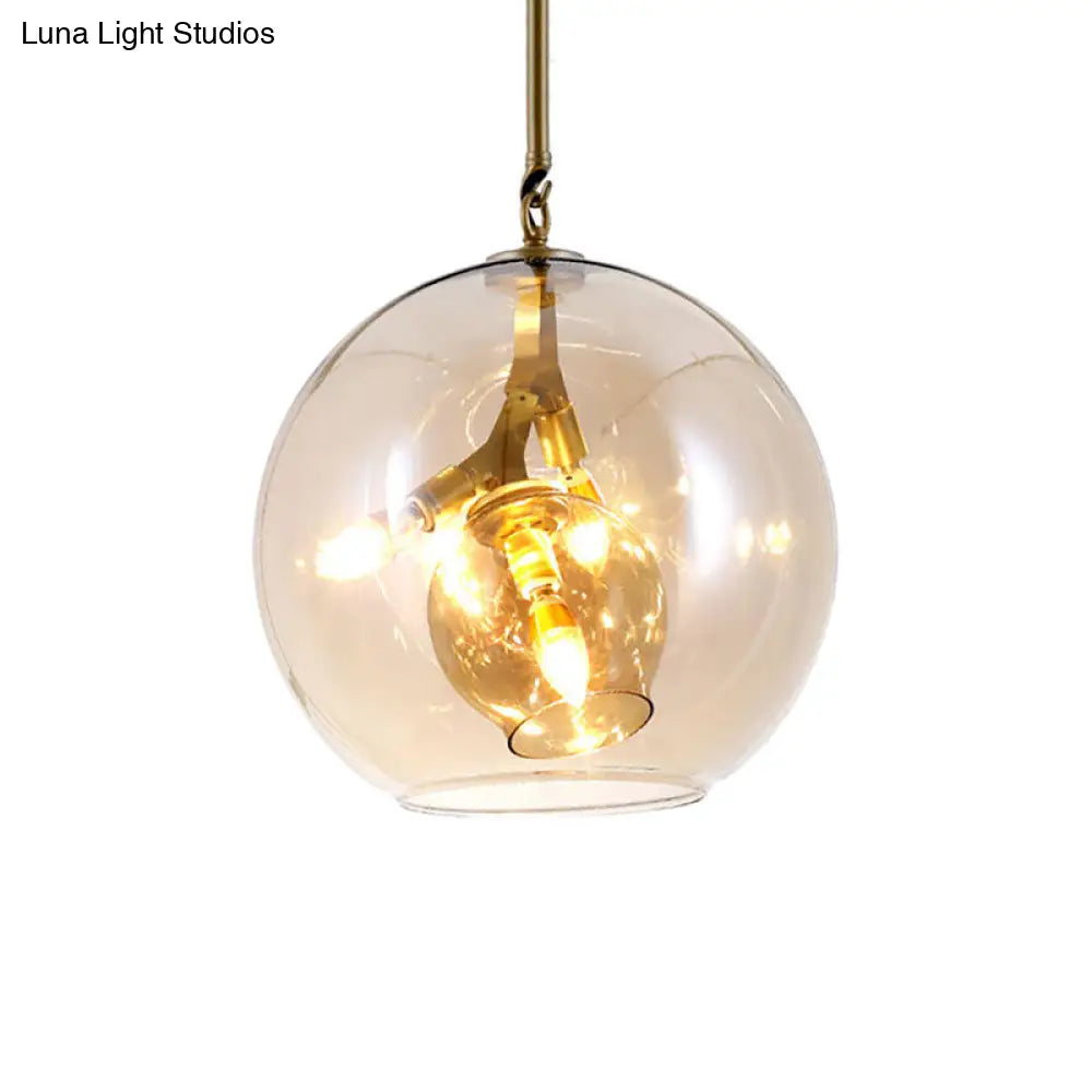 Lámpara de araña moderna de cristal ámbar/transparente para comedor con tres luces.