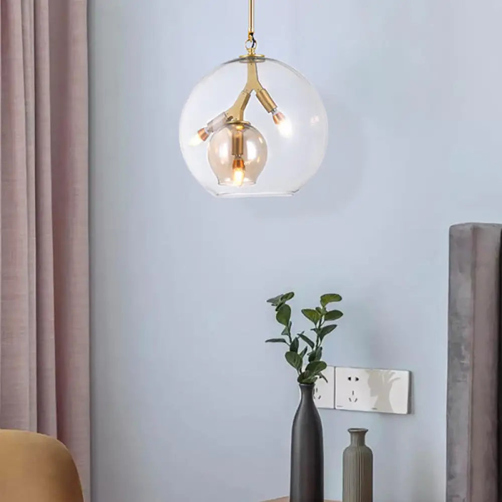 Lámpara de araña moderna de cristal ámbar/transparente para comedor con tres luces.