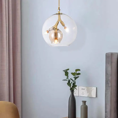 Lámpara de araña moderna de cristal ámbar/transparente para comedor con tres luces.